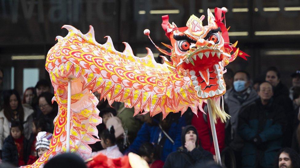 performers take part in the Dragon Parade as part of Manchester's Chinese New Year Celebrations