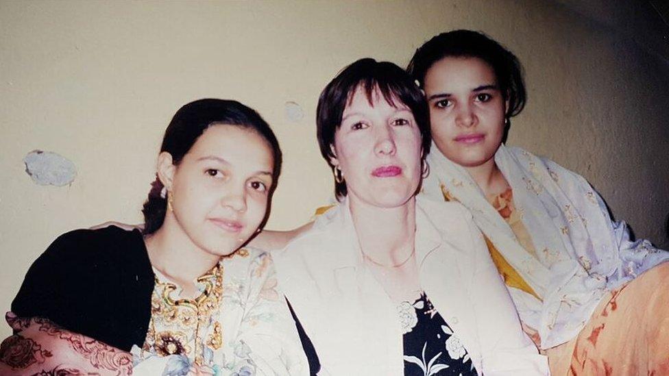 Jackie in 2001 reunited with her two eldest daughters, Nadia and Rahannah, in Yemen