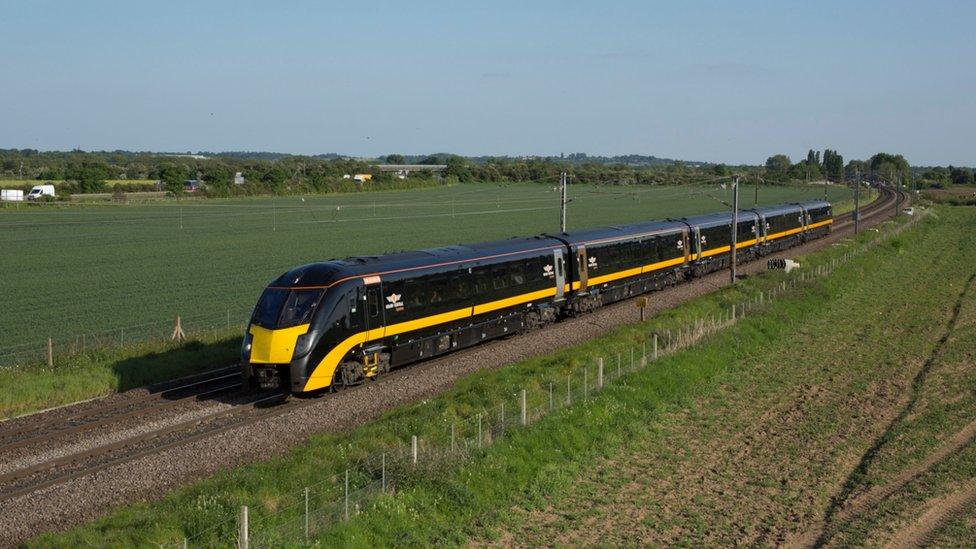 Train running through the countryside