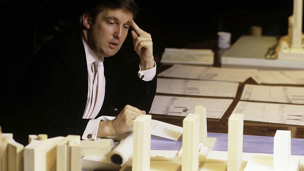 Image shows Donald Trump at a board meeting of his company in 1987