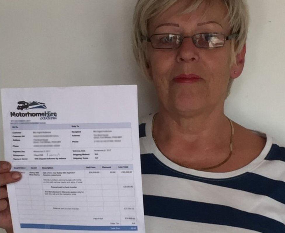 Ingrid Anderson with the receipt for payment from Motorhome Hire Scotland