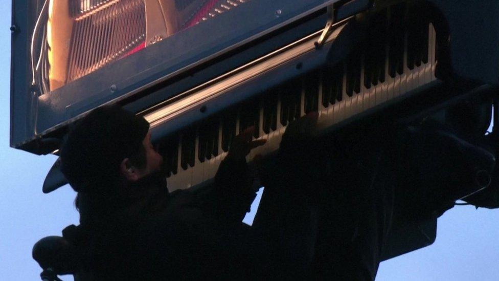 Alain Roche playing piano