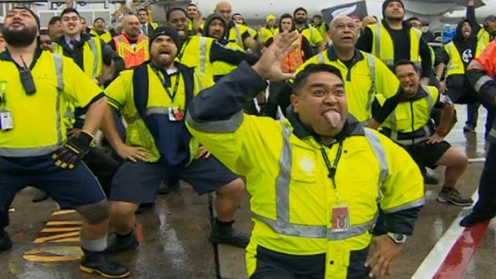 Airport staff in tarmac haka