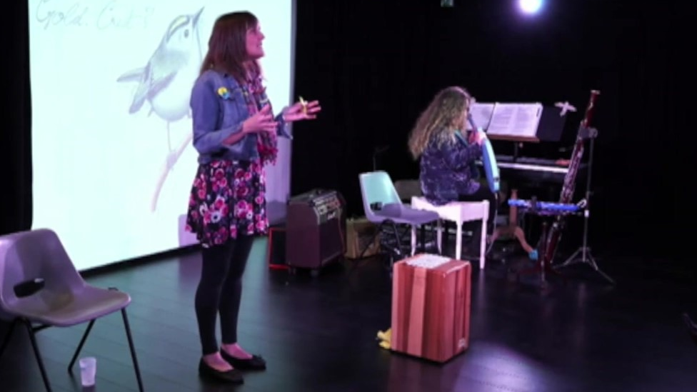 Women performing a play