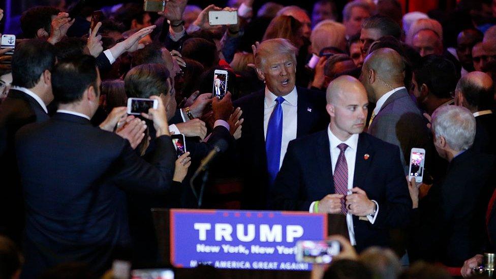 US Republican presidential frontrunner Donald Trump arrives for a celebration rally at Trump Tower in New York on April 26, 2016 after winning primaries in Pennsylvania, Maryland, Connecticut, Rhode Island and Delaware