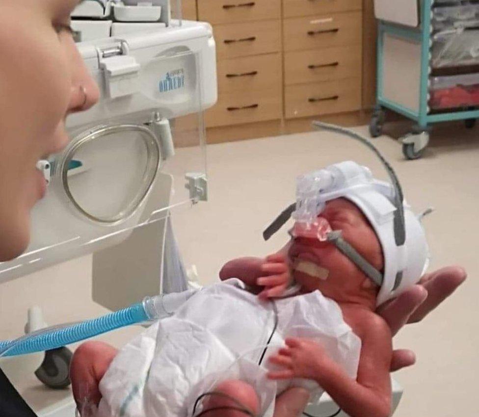 Zoe Stewart holding her daughter Niamh for the first time