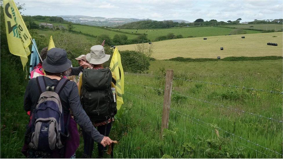 Protesters walking to Cornwall