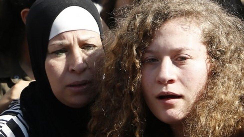 Ahed Tamimi (R) and her mother Nariman