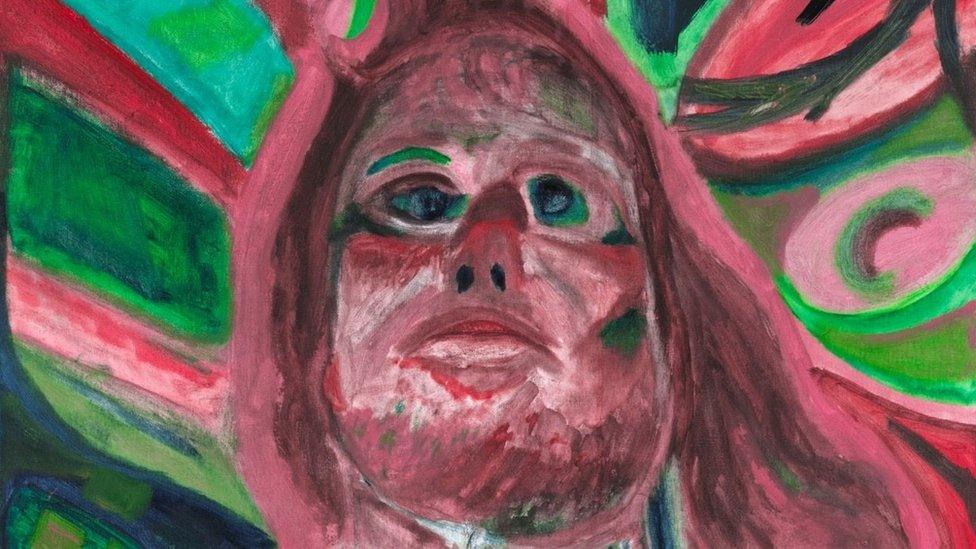 An artwork depicting a man's face with green and pink colours