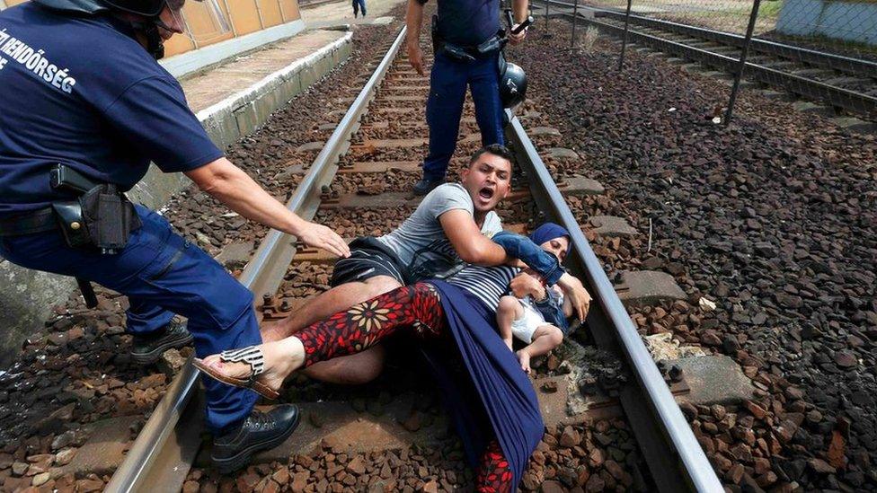 Migrant and police at Bicske, Hungary, 3 September 2015