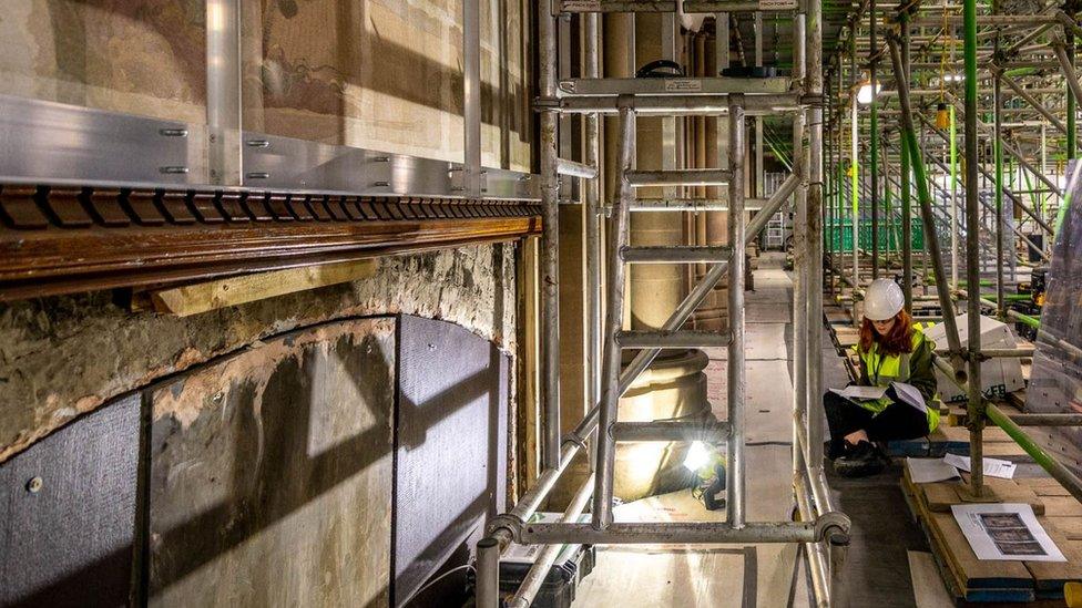 Woman working on Manchester Town Hall renovation