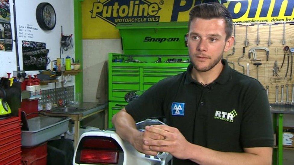 Daniel Hegarty in a bike workshop