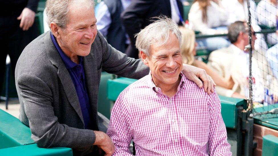 Governor Abbott at a baseball game with former president George W Bush