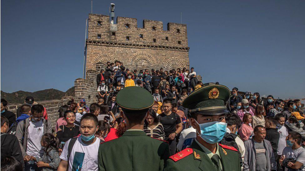 Scores of people are seen on the Great Wall of China