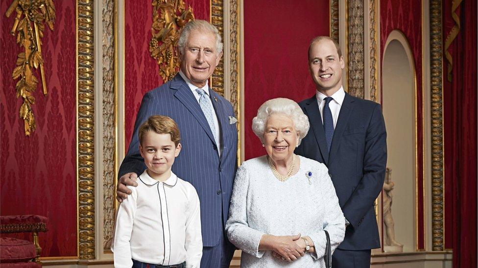 A picture of the Queen with the next three heirs to the throne - George, Charles and William