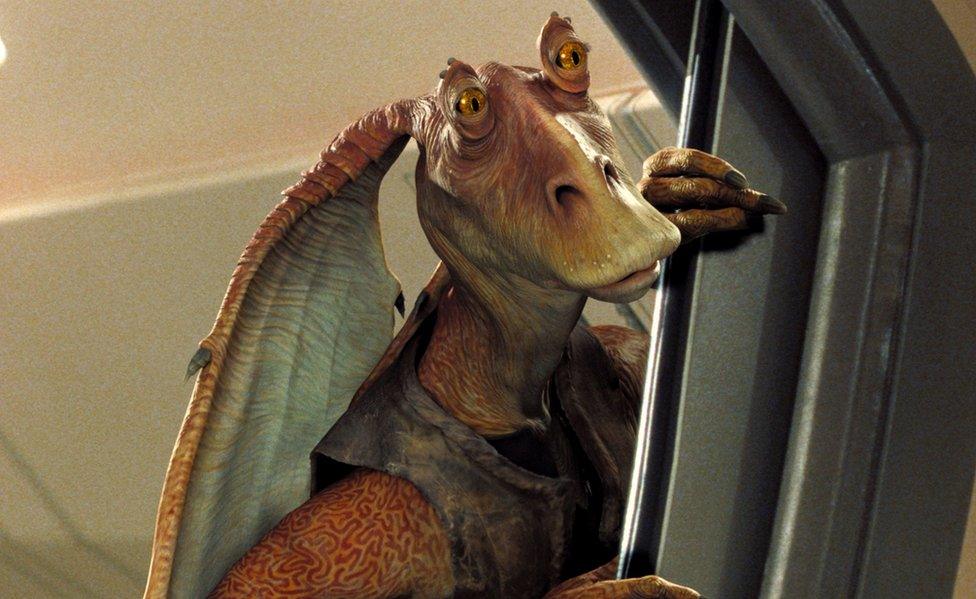 A picture of the big-eared orange alien Jar Jar Binks from the Star Wars prequel films