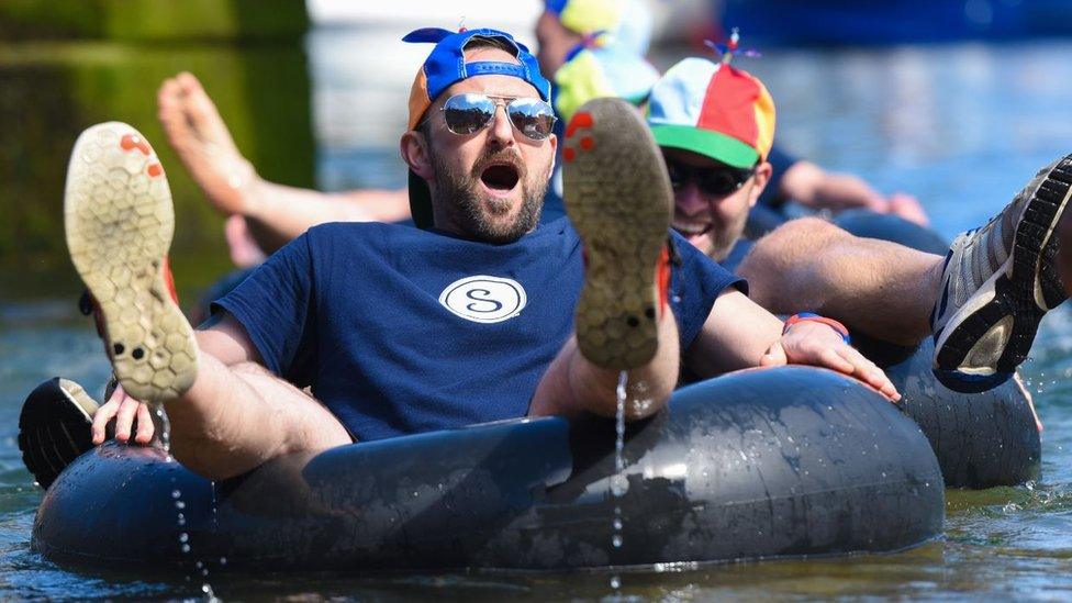 A team taking part in the snake race