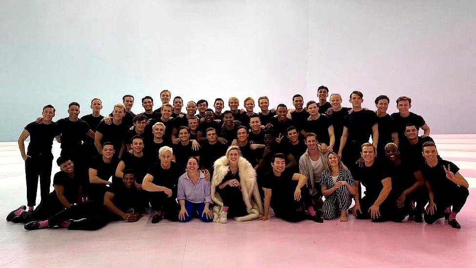 Group photo of all actors and dancers playing Kens in Barbie film