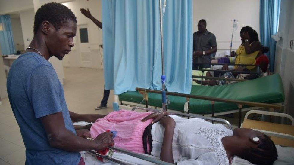 Victims of a transit accident receive medical attention at La Providence Hospital on March 12, 2017 in Gonaives