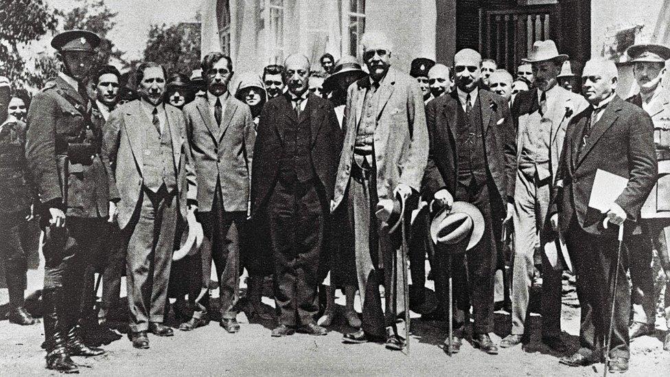 Photo taken in 1925 shows Arthur Balfour (C) and Chaim Weizmann (3rd-R), the then future first President of Israel, visiting Tel Aviv