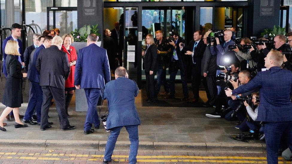 Boris Johnson arrives at a fringe meeting during the Conservative Party conference