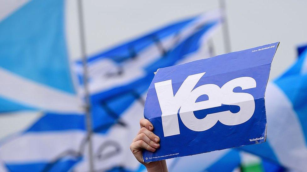 Signs with Yes at march for Scottish independence in 2014