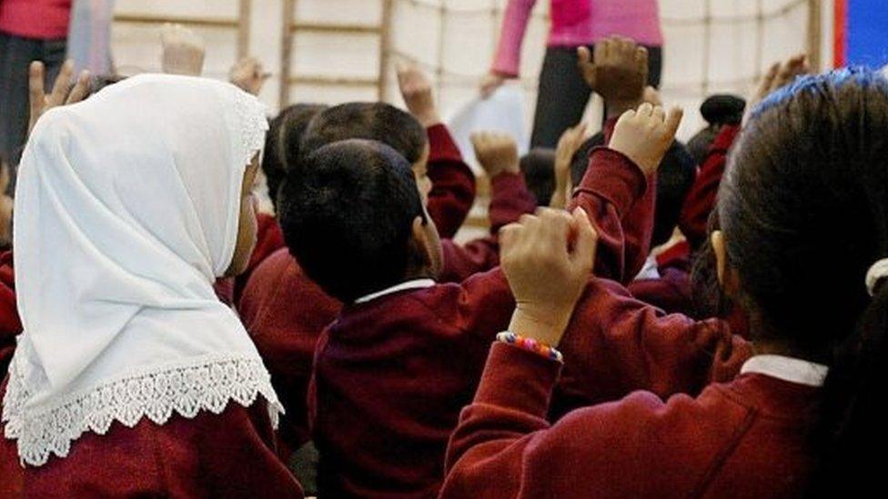 A schoolgirl wearing a hijab