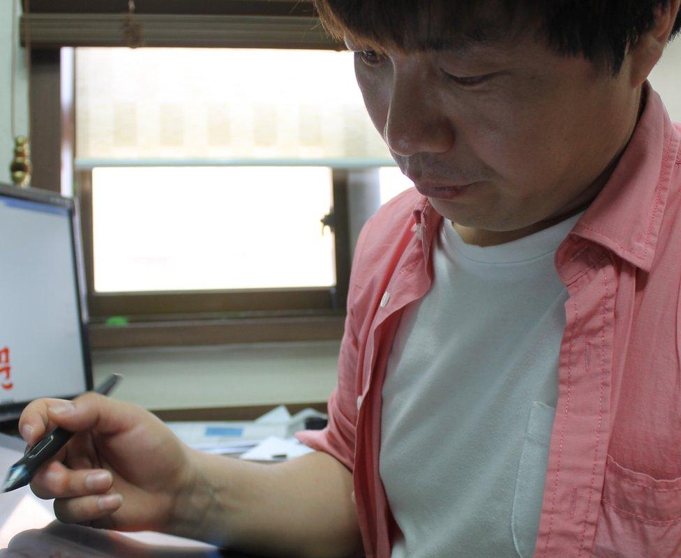 Choi Seong-guk at work in his studio in Seoul