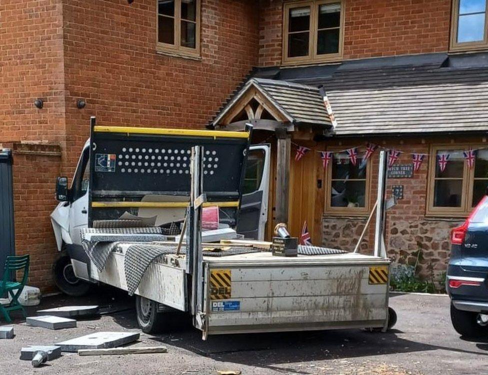 Truck crashed into house