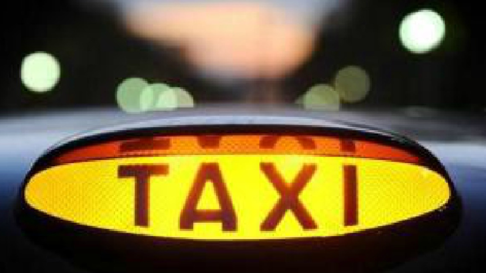 A taxi sign