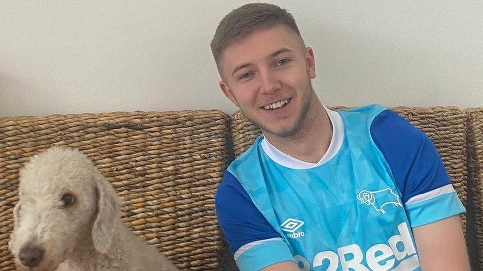 Derby County fan Isaac Hanlon and his dog