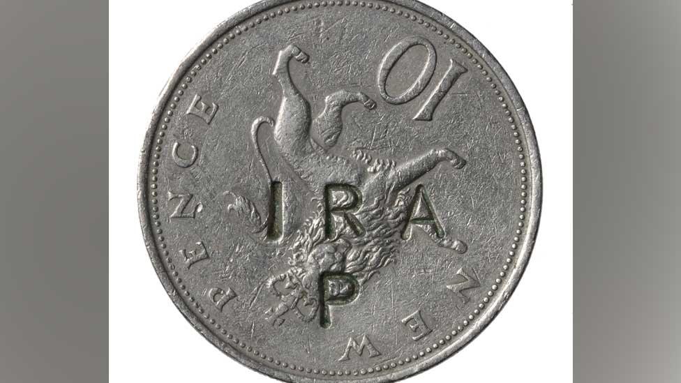 Defaced 10p coin