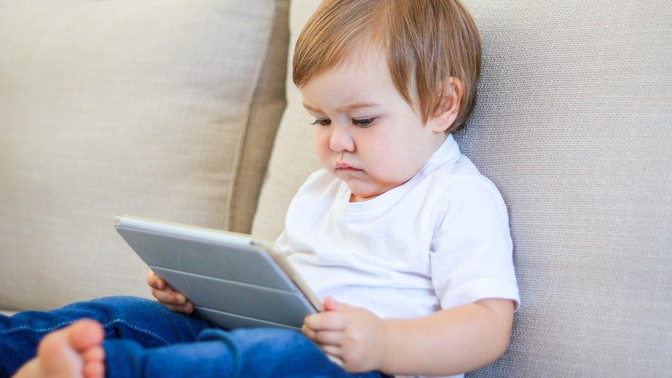 Boy using a screen