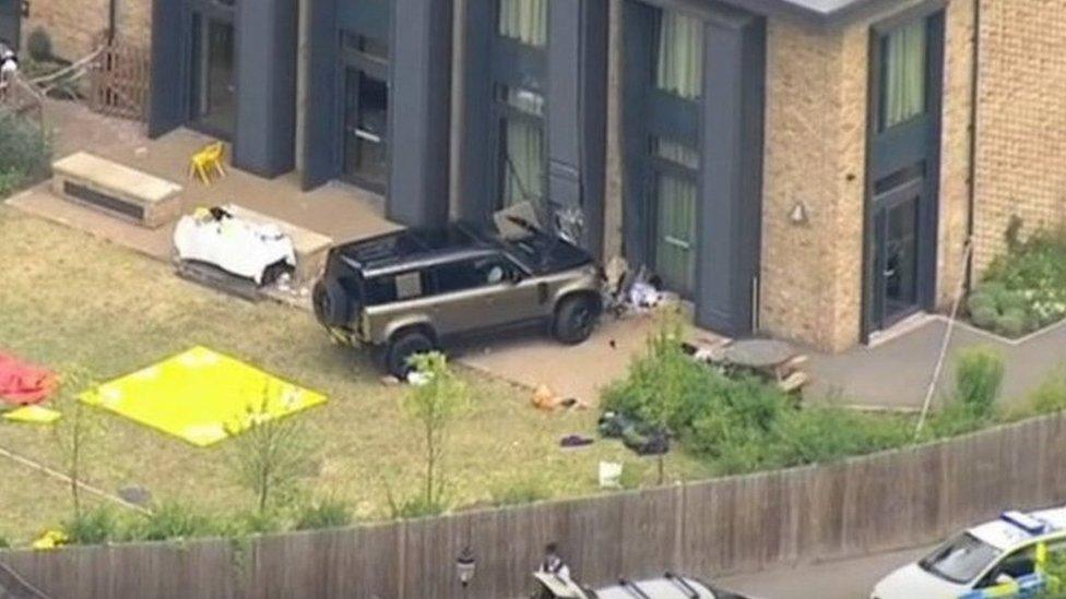 A gold-coloured Land Rover inside the grounds of The Study Preparatory School in Camp Road, Wimbledon, south London