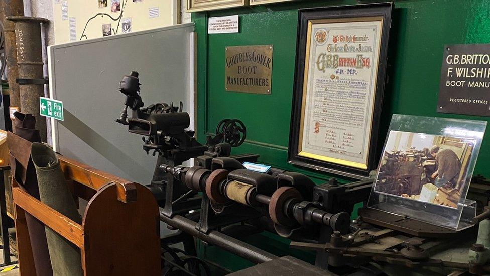 Image of an exhibit about boot makers