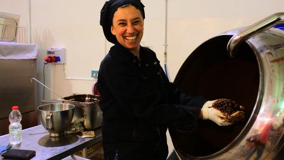 Karina Chepelinski working at the De Karina chocolate factory