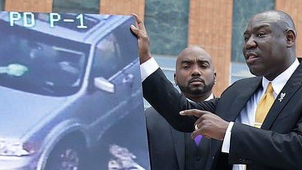 Attorney Benjamin Crump, center, one of the attorneys for Crutcher"s family, speaks about Terence Crutcher during a news conference about the shooting death of Crutcher Tuesday, Sept. 20, 2016 in Tulsa, Okla