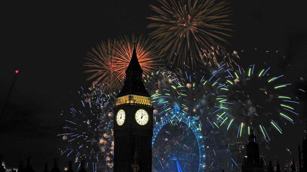 Fireworks go off behind Elizabeth Tower - also known as Big Ben