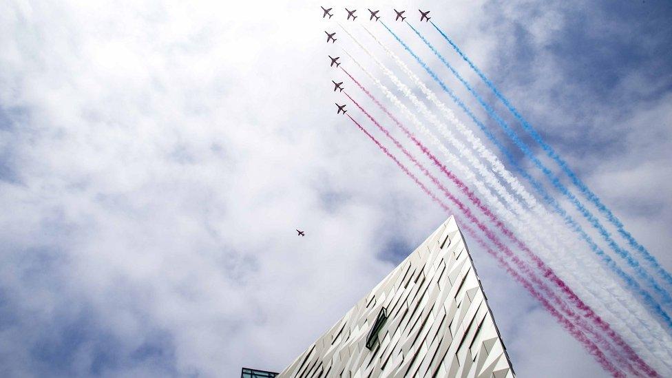 The Red Arrows pass over The Titanic Quarter in Belfast