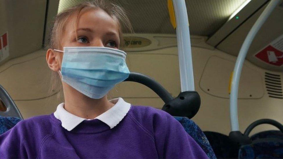 Schoolgirl on bus