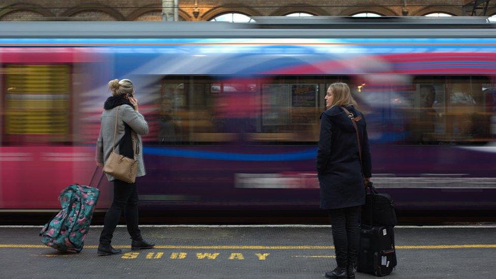 Passengers waiting at Preston railway station