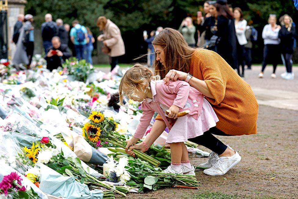 Flowers and tributes to Queen Elizabeth II are pictured outside of Windsor Castle on 9 September 2022