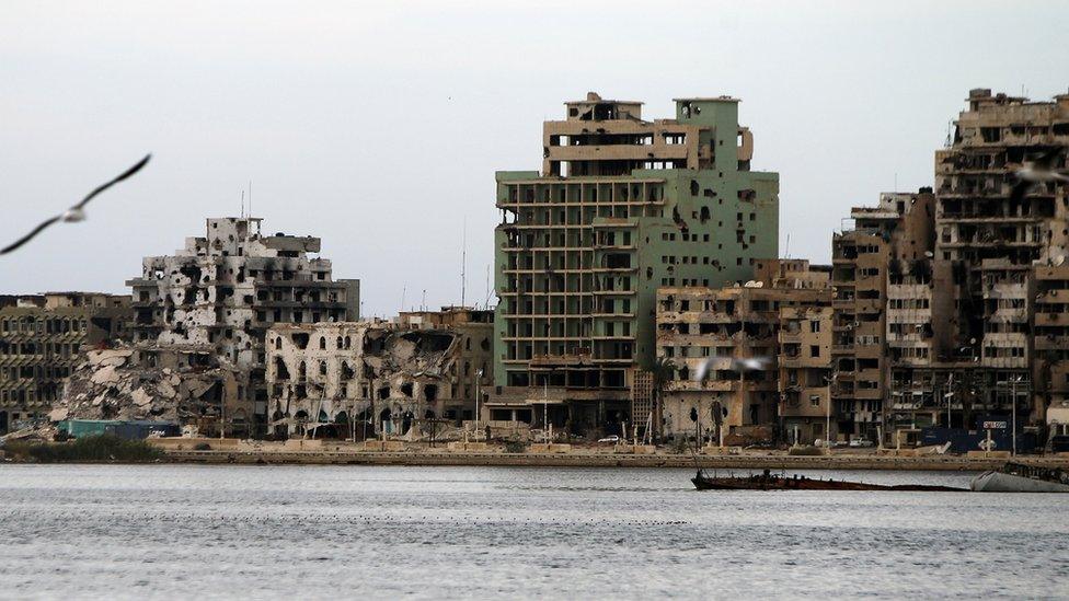 A general view shows destroyed buildings in Libya's eastern coastal city of Benghazi on October 20, 201