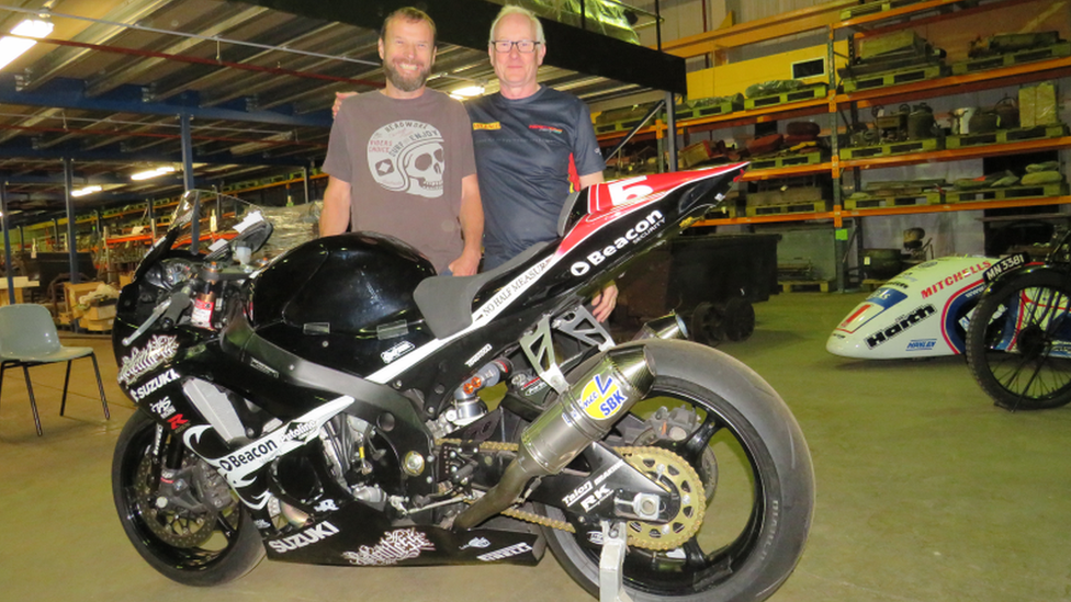 Bruce Anstey and Clive Padget with the motorcylce