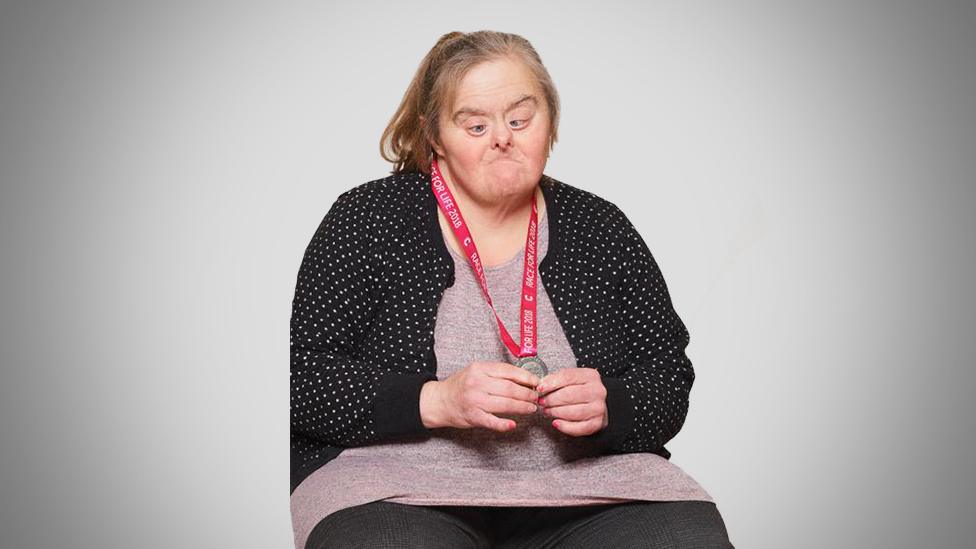 Geri Stephenson holding her medal