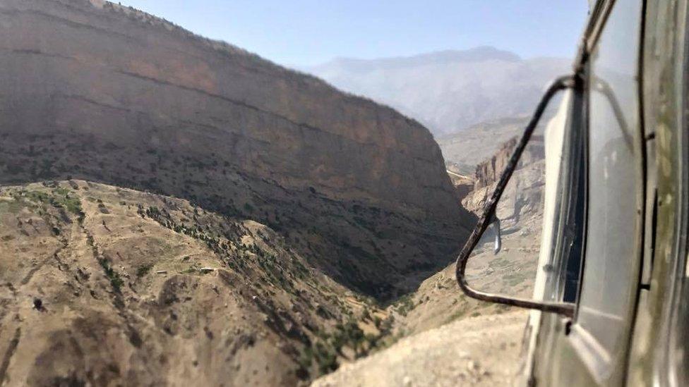 The view of the mountains from a Soviet era UAZ four-wheel-drive vehicle