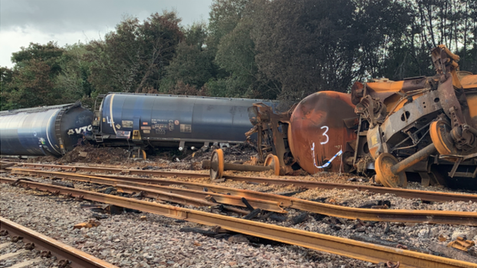 The burnt out wreckage of the train crash