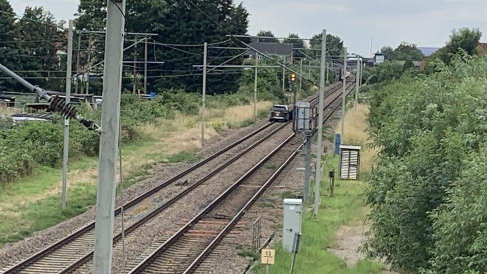 Car on railway track