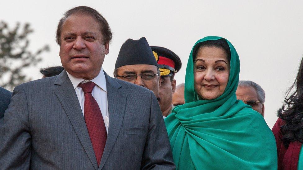 Prime Minister of Pakistan Nawaz Sharif poses with his wife, Kulsoom Nawaz Sharif, upon his arrival for the 18th SAARC Summit on 25 November 2014 in Kathmandu, Nepal