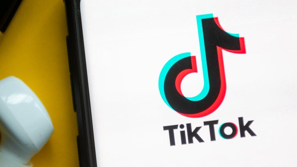 Picture of TikTok and a headphone